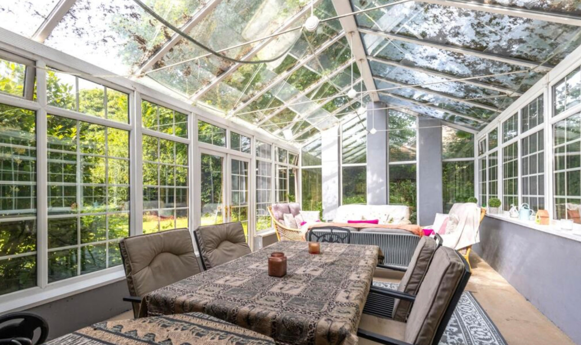 Conservatory dining area overlooking the garden